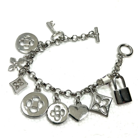NWT SILVER KEY LOCK 🔐 HEART 💙 FLORAL BRACELET - Picture 2 of 3